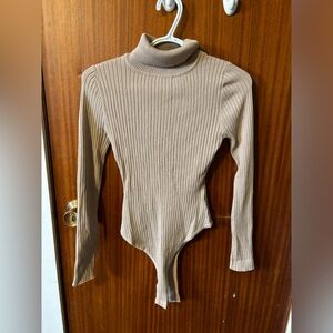Taupe turtleneck thong body suit